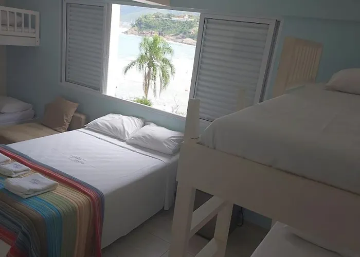 MANSÃO TENÓRIO - Suítes, Estudio ou Cobertura Pé na Areia
