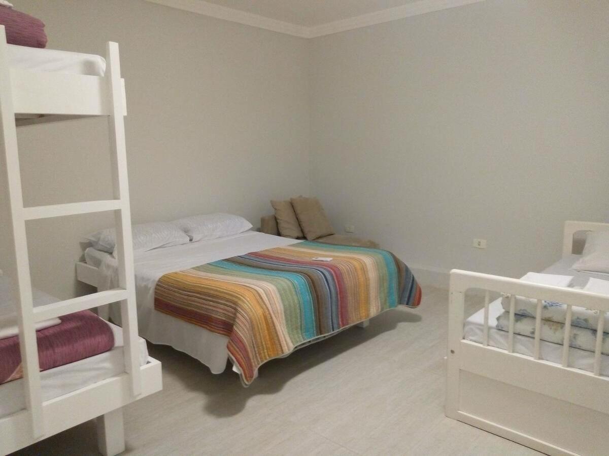 Mansão Tenório - Suítes, Estudio Ou Cobertura Pé Na Areia Casa de hóspedes Ubatuba